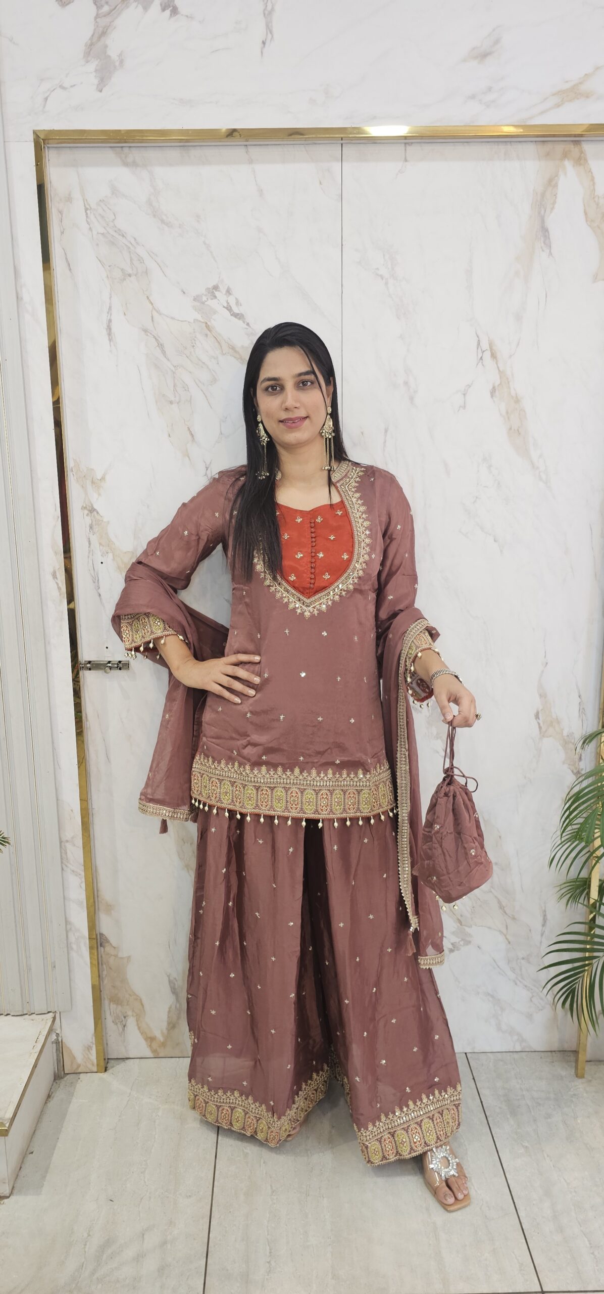 Partywear suit with handwork on chinnon fabric . Item code : 2264TA