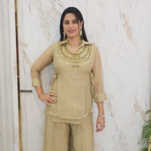 Partywear suit with handwork on Giraffe fabric