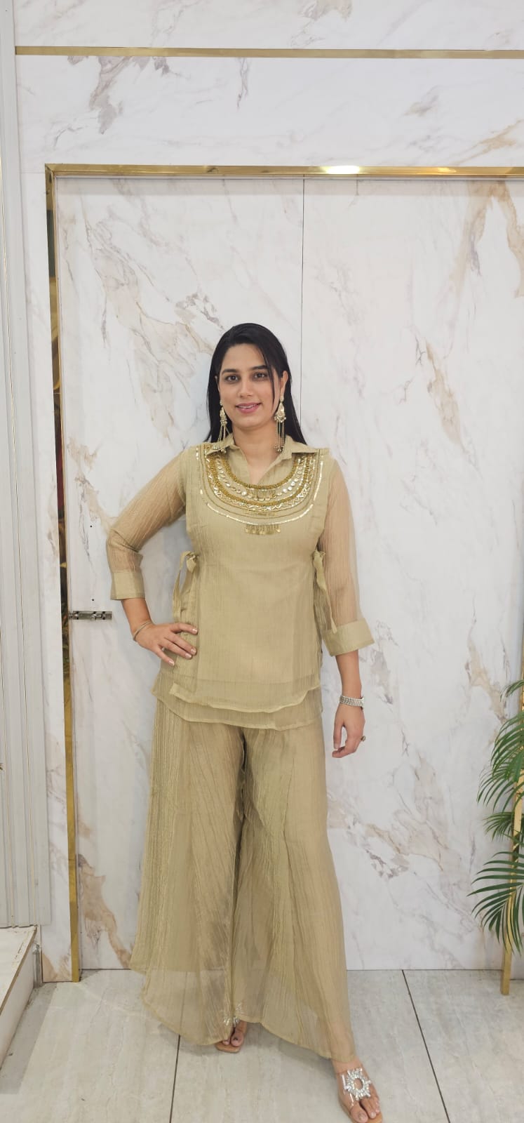 Partywear suit with handwork on Giraffe fabric
